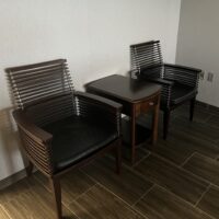 Used Horizontal Slat-Back Lounge Armchairs with Accent Table