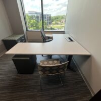 Used L Height Adjustable Desk, Light Woodgrain Top, Charcoal Base